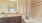 a bathroom with a tub sink and toilet