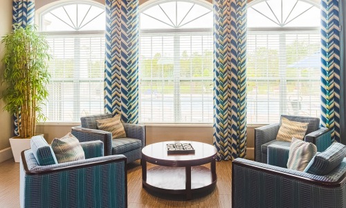 a room with a table and chairs