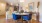 a dining room with a table and chairs