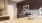 a kitchen with black cabinets