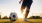 a person kicking a soccer ball