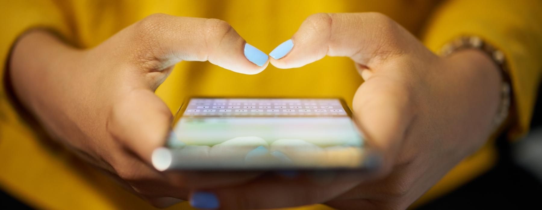 a person holding a device