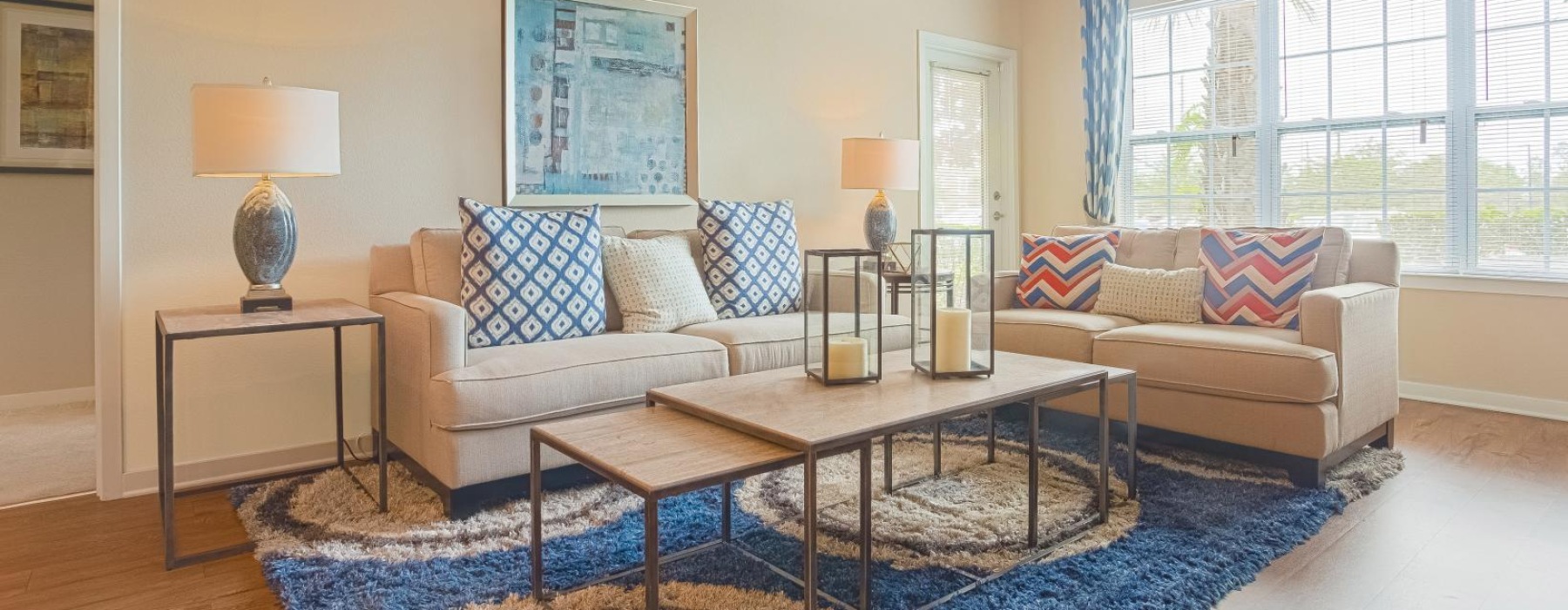 a living room with a couch and coffee table